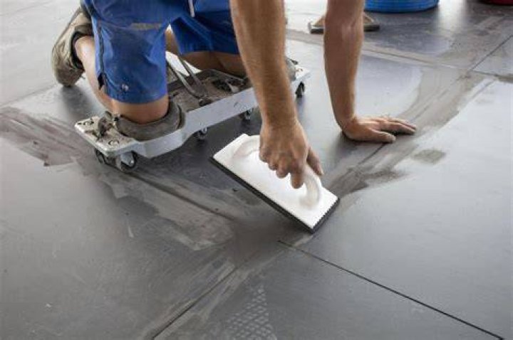 Can I grout straight after tiling?