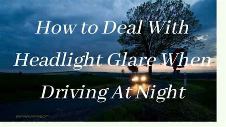 How do I reduce the glare on my oncoming headlights at night?