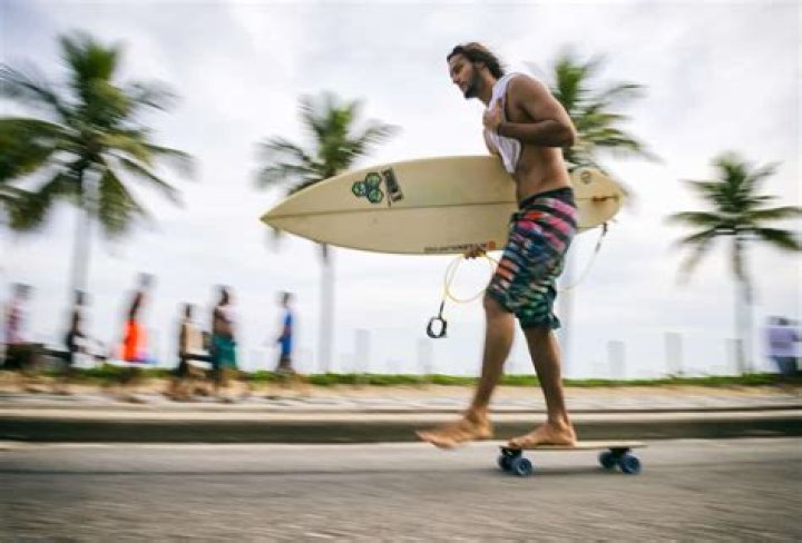 Why do surfers wear board shorts?
